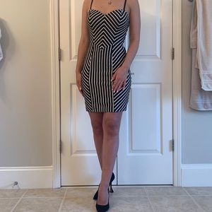 Guess size S. black & white strip pattern dress.